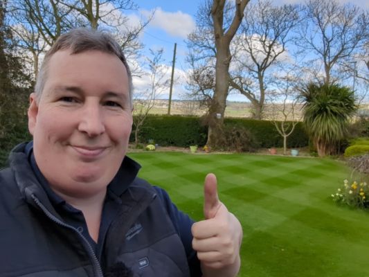 Robbie with the lawn in the back ground