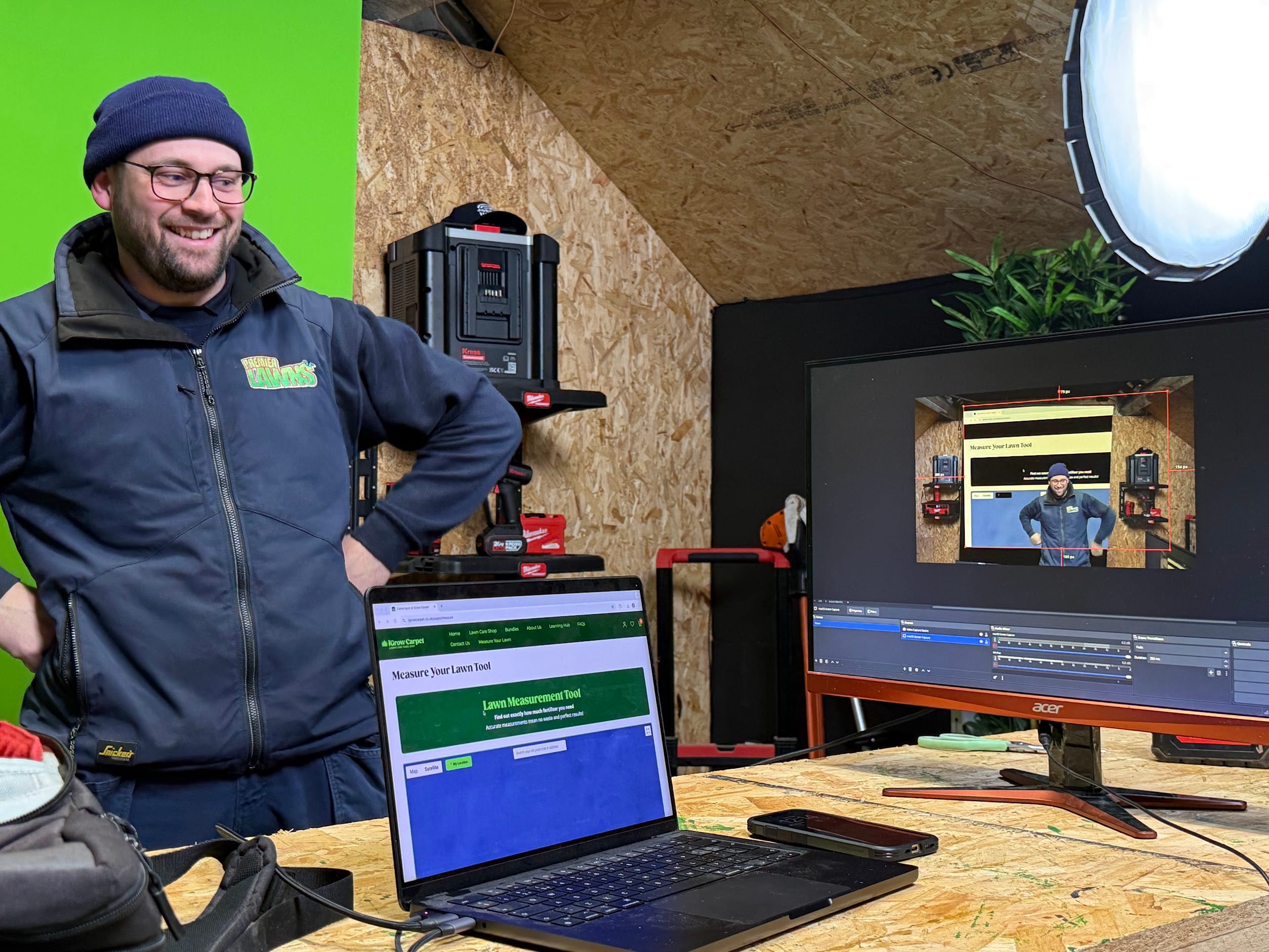 Jason Ellis of Premier Lawns laughing in the Premier Lawns Media studio